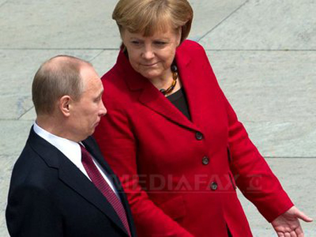 angela-merkel-putin-afp