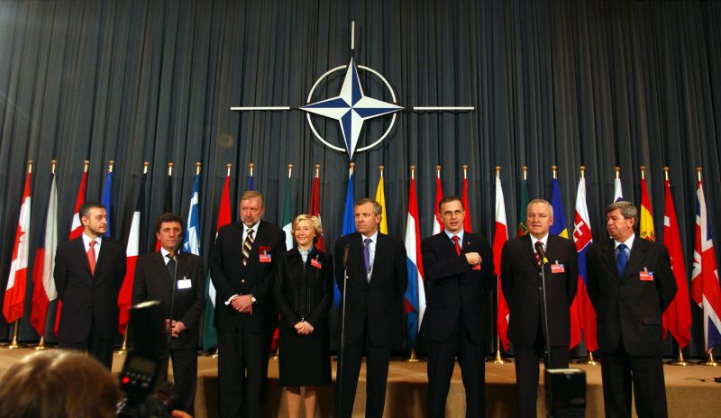 Accession Ceremony for the Seven New NATO Members - NATO Secretary General’s joint news conference with Foreign Ministers of the seven new members (2 April 2004) 
Solomon Passy, Minister of Foreign Affairs, Bulgaria
Antanas Valionis, Minister of Foreign Affairs, Lithuania
Dimitrij Rupel, Minister of Foreign Affairs, Slovenia 
Kristiina Ojuland, Minister of Foreign Affairs, Estonia
NATO Secretary General, Jaap de Hoop Scheffer
Mircea Dan Geoana, Minister of Foreign Affairs, Romania 
Rihards Piks, Minister of Foreign Affairs, Latvia
Eduard Kukan, Minister of Foreign Affairs, Slovakia - foto credit nato.int