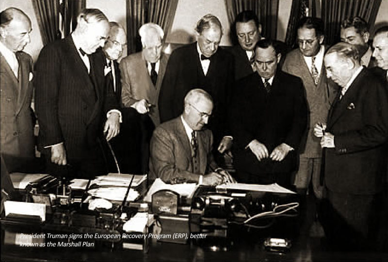 President Truman signs the European Recovery Program (ERP), better known as the Marshall Plan - foto preluat de pe beyondplanb.eu