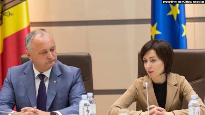 Maia Sandu (dreapta) și Igor Dodon (stânga) - foto preluat de pe romania.europalibera.org